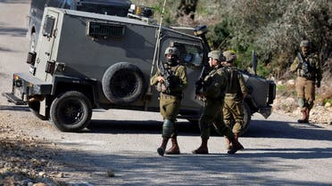 Israeli forces secure an area after attempted stabbing attack near Ramallah, in the Israeli-occupied West Bank, on January 21, 2023. (Reuters)