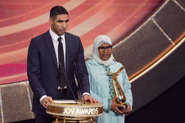 Moroccan football player Achraf Hakimi receiving the award for Best Male Athlete. (Twitter)