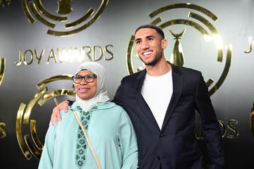 Moroccan football player Ashraf Hakimi poses with his mother at the Joy Awards in Riyadh, Saudi Arabia. (Supplied) 