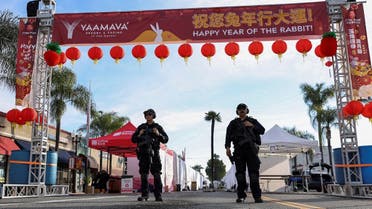 Police officers guard the area near the location of a shooting that took place during a Chinese Lunar New Year celebration, in Monterey Park, California, U.S. January 22, 2023. REUTERS/Mike Blake