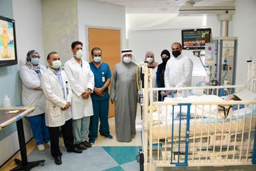 Dr. Al-Rabeeah checks on the majesty of the Iraqi twins