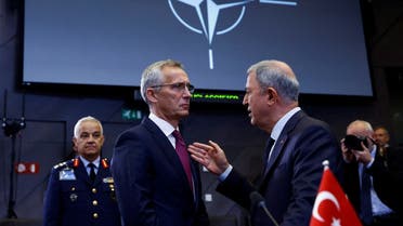 NATO Secretary General Jens Stoltenberg and Turkey’s Defense Minister Hulusi Akar attend a North Atlantic Council during a NATO defense ministers meeting, with Finland and Sweden as invitees, at the Alliance’s headquarters in Brussels, Belgium October 13, 2022. (Reuters)
