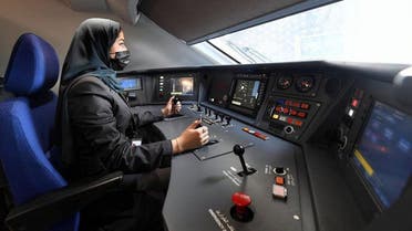 One of the new female drivers of the Haramain High Speed Express sits at the controls. (SPA)