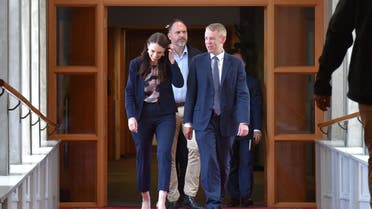 New Zealand Prime Minister Jacinda Ardern walks with incoming Labour leader Chris Hipkins at Parliament House in Wellington, New Zealand January 22, 2023 ahead of a vote to confirm Hipkins as Labour's leader, replacing Ms Ardern. (Reuters)