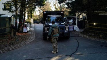 Secret Service personnel park vehicles in the driveway leading to U.S. President Joe Biden's house after classified documents were reported found there by the White House in Wilmington, Delaware, US, January 15, 2023. (Reuters)