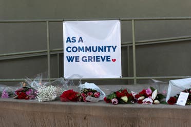 Flowers are pictured in a public square near the City Hall to honor the victims, the day after a mass shooting at two locations in the coastal city of Half Moon Bay, California, U.S., January 24, 2023. (Reuters)