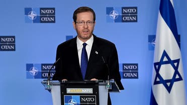 President of the State of Israel Isaac Herzog delivers a speech following a meeting with NATO Secretary general at the NATO Headquarters in Brussels on January 26, 2023. (AFP)