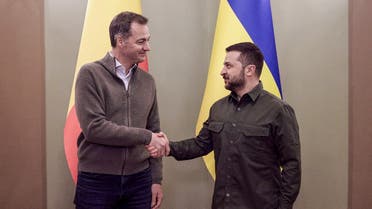 Belgium’s Prime Minister Alexander De Croo (L) shakes hands with Ukraine’s President Volodymyr Zelensky (R) as he attends his first visit in Ukraine since Russia invaded, in Kyiv, on November 26, 2022, amid the Russian invasion of Ukraine. (Ukrainian Presidential Press Service via AFP)
