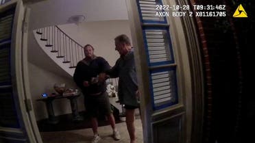 A screenshot from a police body camera video shows David DePape holding onto Paul Pelosi, the husband of then-House Speaker Nancy Pelosi, in the couple’s house on October 28, 2022, in San Francisco District Attorney/Handout via REUTERS THIS IMAGE HAS BEEN SUPPLIED BY A THIRD PARTY REFILE - CORRECTING SOURCE OF THE PICTURE