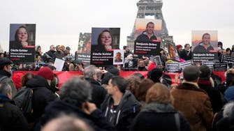 تجمّع في باريس لمطالبة إيران بالإفراج عن "الرهائن" الفرنسيين