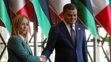 Libya’s Tripoli-based Prime Minister Abdulhamid Dbeibah receives his Italian counterpart Giorgia Meloni, in the capital Tripoli, on January 28, 2023. (AFP)