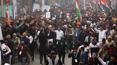 Rahul Gandhi, the leader of India's main opposition Congress party, walks along with his supporters as they take part in the ongoing Bharat Jodo Yatra (Unite India March), in Panipat, India, on January 6, 2023. (Reuters)