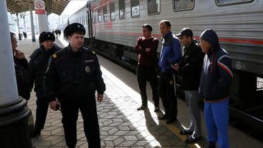 Police officers patrol a railway station following the St. Petersburg metro blast that took place on April 3, in the Siberian city of Krasnoyarsk, Russia, on April 4, 2017. (Reuters)