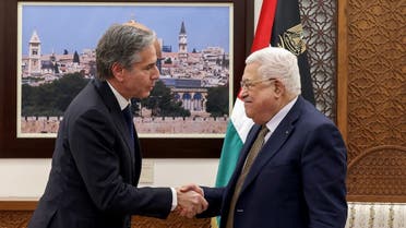 US Secretary of State Antony Blinken shakes hands with Palestinian leader Mahmoud Abbas as they meet in Ramallah in the Israeli-occupied West Bank, on January 31, 2023. (Reuters)