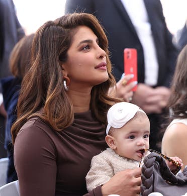 Priyanka Chopra holds her and Nick Jonas' daughter, Malti, during the ceremony where the Jonas Brothers will unveil their star on The Hollywood Walk of Fame in Los Angeles, California, US, January 30, 2023. (Reuters)