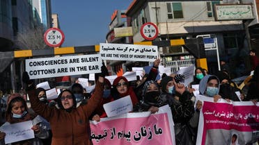 Afghan women shout slogans during a rally to protest against what the protesters say is Taliban restrictions on women, in Kabul, Afghanistan, December 28, 2021. (Reuters)