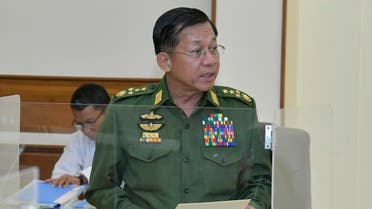 This handout photo from Myanmar's Military Information Team taken and released on January 31, 2023 shows Myanmar's military chief Min Aung Hlaing making a speech during a defense and security council meeting in Naypyidaw. (AFP)
