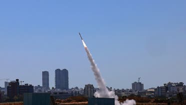Israel’s Iron Dome aerial defense system is activated to intercept a rocket launched from the Gaza Strip, controlled by the Palestinian Hamas movement, above the southern Israeli city of Ashdod, on May 12, 2021. (AFP)
