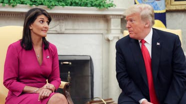 Former US President Donald Trump talks with former UN Ambassador Nikki Haley in the Oval Office of the White House after it was announced the president had accepted the Haley's resignation in Washington, US, October 9, 2018. (Reuters)