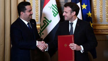 French President Emmanuel Macron welcomes Iraq's Prime Minister Mohammed al-Sudani at the Elysee Presidential Palace, in Paris, France, January 26, 2023. (Christophe Archambault/Pool via Reuters)