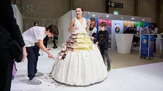 Swiss baker breaks Guinness World Record with 131.15 kg wedding dress made from cake