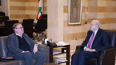 Lebanese caretaker PM Najib Mikati (R) meeting with French Envoy in charge of coordinating the international aid to Lebanon Pierre Duquesne, February 3, 2023. (AFP) 