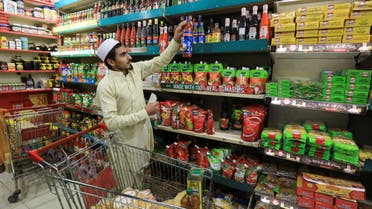 متجر في بيشاور - باكستان (رويترز)  اقتصاد مناسبة 