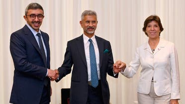 French Foreign Minister Catherine Colonna (R) shakes hands with United Arab Emirates Foreign Minister Abdullah bin Zayed Al Nahyan (L) and Indian External Affairs Minister Dr. S. Jaishankar (C) during a trilateral ministerial meeting in New York on September 19, 2022, on the sidelines of the 77th session of the UN General Assembly. (AFP)