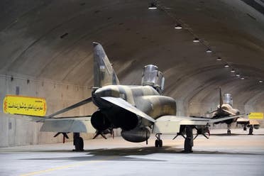 A handout picture provided by the Iranian Army office on February 7, 2023 shows a fighter jet during the unveiling of Iran’s first underground military air base in an undisclosed location. (Iranian Army office via AFP)