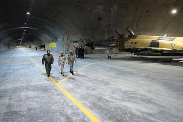Iran’s Army chief, Major General Abdolrahim Mousavi and Iranian Armed Forces Chief of Staff, Major General Mohammad Bagheri visit the first underground air force base, called “Eagle 44” at an undisclosed location in Iran, in this handout image obtained on February 7, 2023. (West Asia News Agency via Reuters)