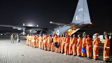 Members of the Urban Search and Rescue team of Pakistan Army, board an Air Force aircraft, to help in the aftermath of an earthquake in Turkey, at Nur Khan airbase in Rawalpindi, Pakistan, on February 7, 2023. (Reuters)