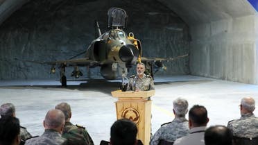 A handout picture provided by the Iranian Army office on February 7, 2023 shows Commander-in-Chief of the Iranian Army Major General Abdolrahim Mousavi speaking during the unveiling of the first underground military base for fighter jets. (Iranian Army office via AFP)