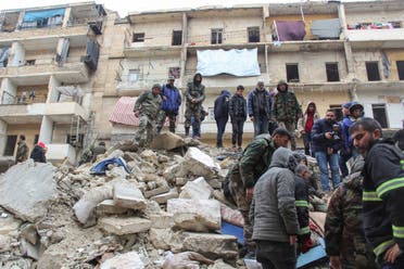 Rescuers and members of the Syrian army search for survivors under the rubble, following an earthquake, in Aleppo, Syria February 6, 2023. (Reuters)