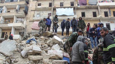 Rescuers and members of the Syrian army search for survivors under the rubble, following an earthquake, in Aleppo, Syria February 6, 2023. (Reuters)