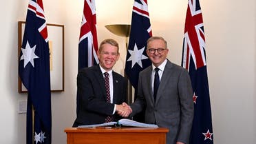 New Zealand Prime Minister Chris Hipkins shakes hands with Australian Prime Minister Anthony Albanese ahead of a bilateral meeting at Parliament House in Canberra, Australia, February 7, 2023. (Reuters)
