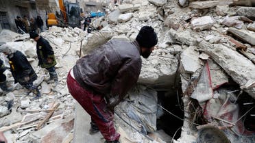 Syrian Civil Defense workers and security forces search through the wreckage of collapsed buildings, in Aleppo, Syria, Monday, Feb. 6, 2023. A powerful earthquake rocked wide swaths of Turkey and neighboring Syria on Monday, toppling hundreds of buildings and killing and injuring thousands of people. (AP Photo/Omar Sanadiki)