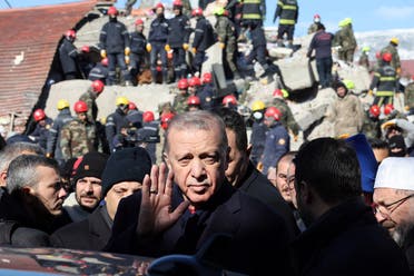Turkish President Recep Tayyip Erdogan tours the site of destroyed buildings during his visit to the city of Kahramanmaras in southeast Turkey, two days after the severe earthquake that hit the region on February 8, 2023. (AFP)
