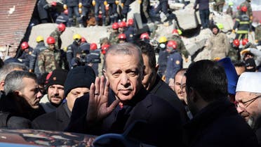 Turkish President Recep Tayyip Erdogan tours the site of destroyed buildings during his visit to the city of Kahramanmaras in southeast Turkey, two days after the severe earthquake that hit the region on February 8, 2023. (AFP)