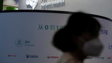 A person passes by a sign of Horizon Robotics during the World Artificial Intelligence Conference, following the coronavirus disease (COVID-19) outbreak, in Shanghai, China, September 1, 2022. REUTERS/Aly Song