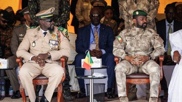 Mali’s interim leader and head of Junta, Colonel Assimi Goita (R) and Guinea Interim leader and head of Junta, Mamady Doumbouya (L), are seen in Bamako, Mali, on September 22, 2022 during Mali’s Independence Day military parade. (AFP)