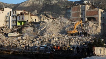 Men work on the site of collapsed buildings, as the search for survivors continues, in the aftermath of a deadly earthquake in Hatay, Turkey, on February 9, 2023. (Reuters)
