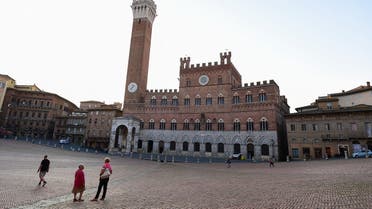 A picture taken on September 15, 2020 shows the Torre del Mangia tower, adjacent to the Palazzo Pubblico (Town Hall) located in the Piazza del Campo, Siena’s premier square. (AFP)