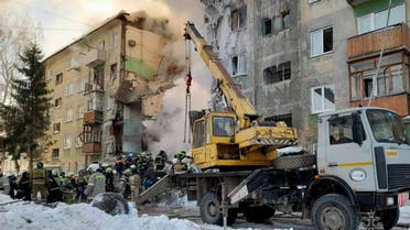 Rescuers remove the rubble of a five-floor residential building heavily damaged in a gas explosion in Novosibirsk, Russia February 9, 2023. (Reuters)