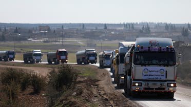 Convoys carrying humanitarian aids from Kurds drive to the crossing, to be taken to Syria's quake-hit northwest, at Manbij countryside, Aleppo Governorate, Syria February 9, 2023. (Reuters)