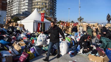 Turkish students living in North Macedonia and volunteers prepare humanitarian aid for Turkish and Syrian earthquake victims at a collecting point on the main square of Skopje, on February 10, 2023. (AFP)