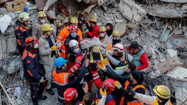 Rescuers carry 27-year-old survivor Rabia Ofkeli among rubble in the aftermath of a deadly earthquake in Hatay, Turkey February 10, 2023. (Photo used for illustrative purposes, Reuters)