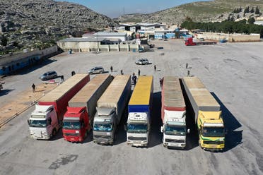 This aerial view shows a United Nations aid convoy that entered opposition-held northwestern Syria from Turkey through the Bab el-Hawa crossing on February 9, 2023, the first since a devastating earthquake that killed thousands. (AFP)