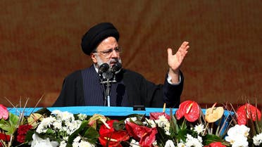 A handout picture provided by the Iranian presidency shows President Ebrahim Raisi addressing the crowds gathered in Tehran’s Azadi Square to mark the 44nd anniversary of the 1979 Islamic Revolution, on February 11, 2023. (Iranian Presidency via AFP)