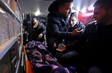 The body of a Palestinian man reportedly killed by Israeli settlers is transported in an ambulance, in the town of Qarawat Bani Hassan in the occupied West Bank province of Salfit on February 11, 2023. (File photo: AFP)