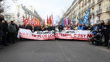 People take part in a demonstration against the French government's pension reform plan as part of the fourth day of national protests, in Paris, France, February 11, 2023. REUTERS/Noemie Olive